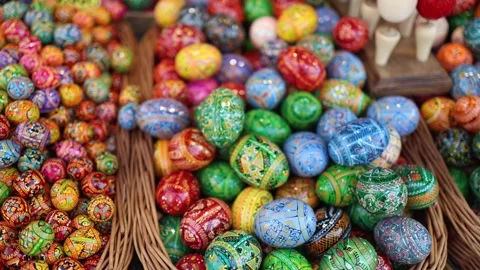 A stunning mix of hand-painted Easter eggs fills woven baskets with color and tr Stock Footage 306677543