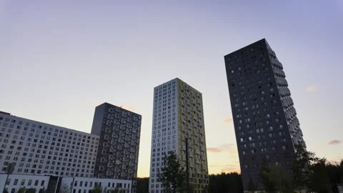 A stunning modern architectural skyline captured beautifully at sunset 库存影片 281027509