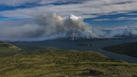 Stunning Mountain Landscape with Dramatic Smoke and Clouds Video stock 323278295