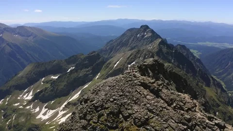 Stunning Mountain Landscape under a Clear Blue Sky Stock Footage 323850022