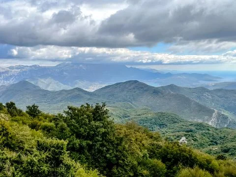 Stunning Mountain Landscape Under Dramatic Clouds Captivates the Eye with Its Stock Photos