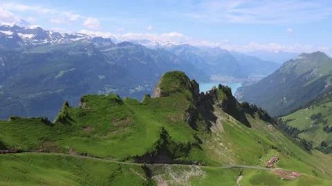 Stunning mountain panorama, view from Brienzer Rothorn with Swiss Alps and lake  Stock Footage 279059049