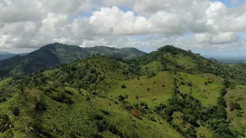 Stunning mountain range covered in grass and trees in Dominican Republic, 4k Stock Footage 154803875