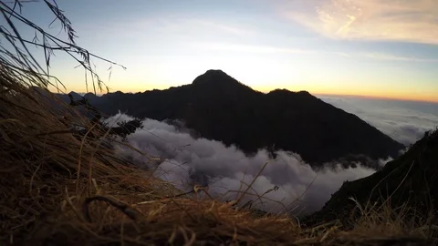 Stunning Mountain Timelapse Above the Clouds on Mt Rinjani at Sunset in Stock Footage 94537743