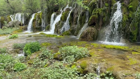 Stunning Multi-Tiered Waterfalls and Mossy Rocks Jiuzhaigou Sichuan China Stock Footage 338373211