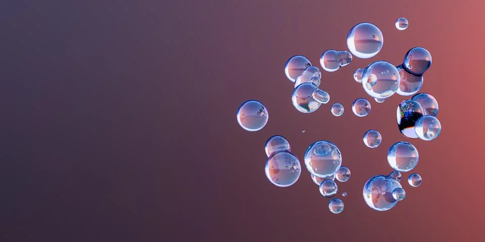 Stunning multiple transparent floating water drops, reflecting light beautifu Stock Photos