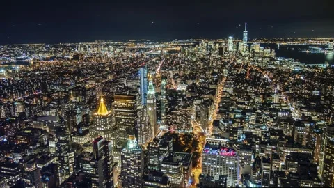 Stunning nighttime aerial view over manhattan, new york city, showing vibra.. Stock Footage 334592860