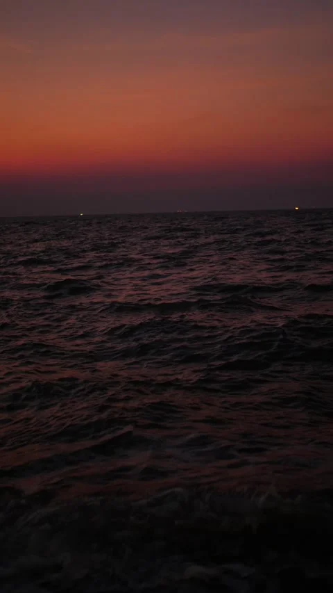 Stunning Ocean Sunset with Gentle Waves on the Shore Stock Footage 303575161