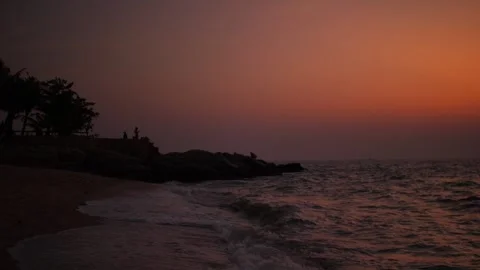 Stunning Ocean Sunset with Gentle Waves on the Shore Stock Footage 303575190