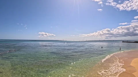Stunning Ocean View With Clear Blue Skies and Golden Sand Beach Stock Footage 317727914
