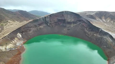 Stunning Okama Crater Lake | Mt. Zao | Japan - 4K Aerial Video Stock Footage 329052264