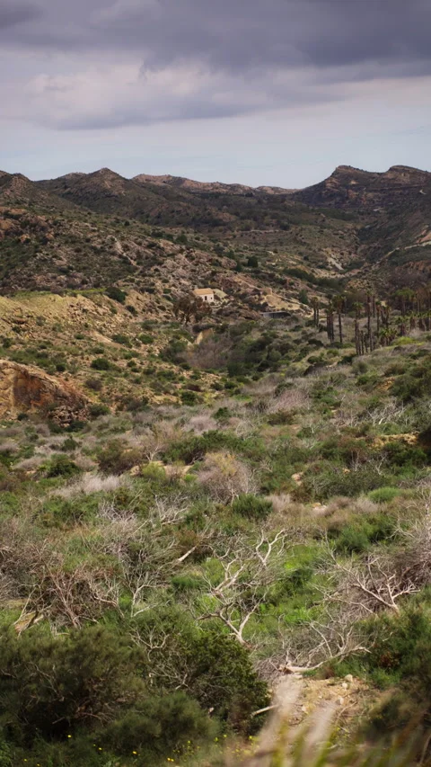 Stunning panoramic view of a desolate and arid mountain landscape, featurin.. Stock Footage 334666924