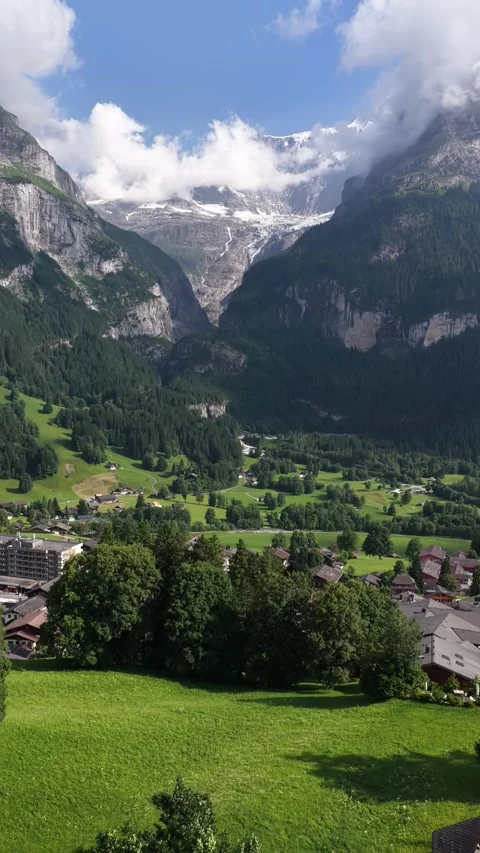 Stunning panoramic view of the grindelwald valley in the swiss alps Stock Footage 318592537