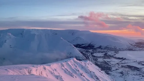 Stunning panoramic view of mountain valley against horizon with sunset and 스톡 동영상 144790577