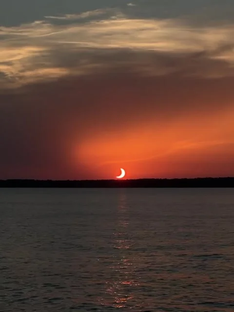 Stunning Partial Solar Eclipse Over Ocean Horizon Vídeos de archivo 342267666