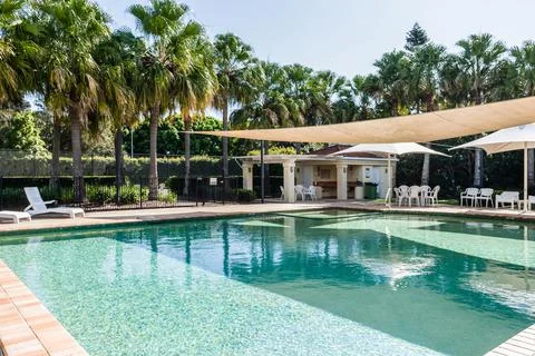 Stunning Pool with Shade Over A Section Stock Photos