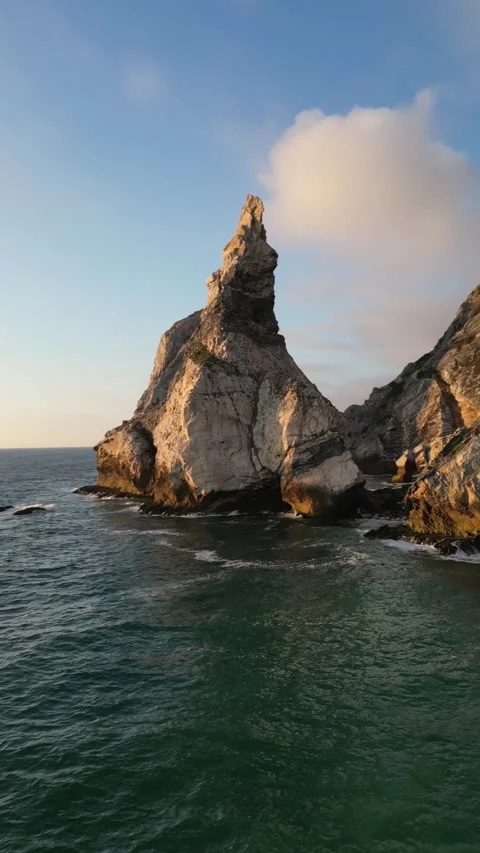 A stunning rock formation in the ocean captivates with its beauty Stock Footage 290510795