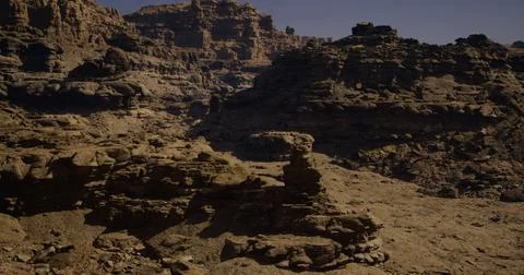 Stunning rock formations create a dramatic landscape in a remote desert area 스톡 일러스트