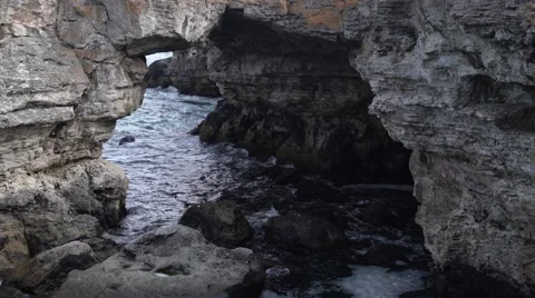Stunning Rocks at Beach and Waves 4K Stock Footage 66562952