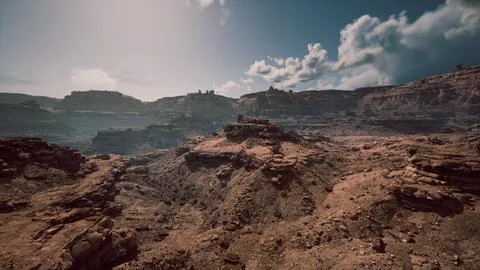 Stunning rocky landscape with distant cliffs and dramatic cloud formations Stock Illustration