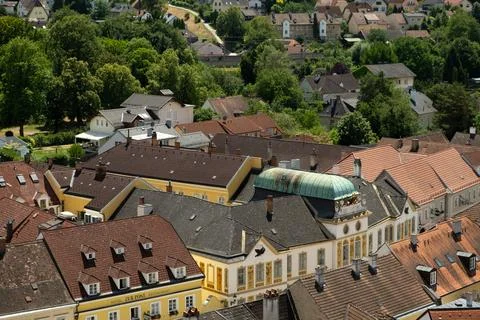 Stunning rooftop pattern of an old Austrian town with a beautiful baroque b.. Stock Photos