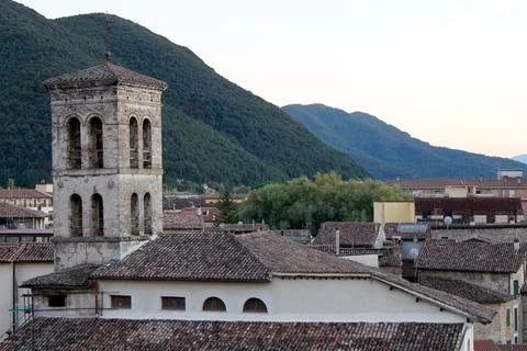 Stunning rooftops of Rieti with mountain backdrop at sunset Stock Photos