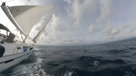 Stunning Sailboat run over the winter sea, cloudy with sun, 360 effect Stock Footage 120742246