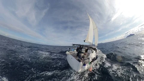 Stunning Sailboat run over the winter sea, cloudy with sun, 360 effect , rear  Stock Footage 120742507