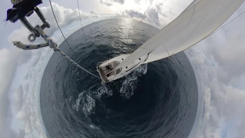 Stunning Sailboat run over the winter sea, cloudy with sun, 360 effect ,above  Stock Footage 120742680