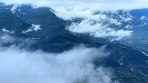 Stunning Sea of Clouds Over Mountain Peaks Natural Beauty 4K Real Shot Stock Footage 320062195