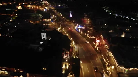 Stunning Shot Of Small Town Usa During Christmas At Night From The Air Stock Footage
