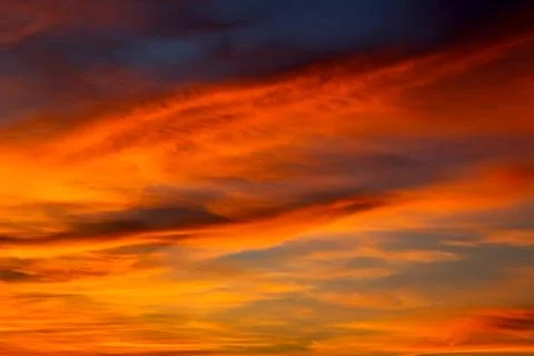 Stunning sky post-sunset with vibrant shades of pink and purple blending in.. Stock Photos