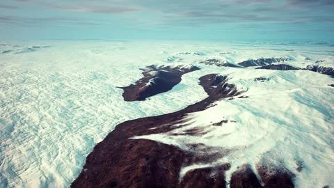 A stunning snow-covered mountain range from above Stock Illustration