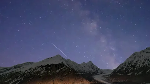 Stunning Star Trails Time-Lapse Over Snow-Capped Himalayan Mountains at Night Stock Footage 313808380