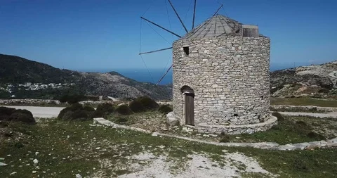 Stunning Stone Windmill on Hill in Greece Stock Footage 106341058