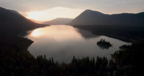 Stunning Sunset Aerial of Pristine Mountain Lake Stock Footage 310356760
