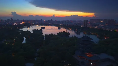 Stunning Sunset Over Daming Lake, Jinan City with Glowing Skyline Stock Footage 331118950