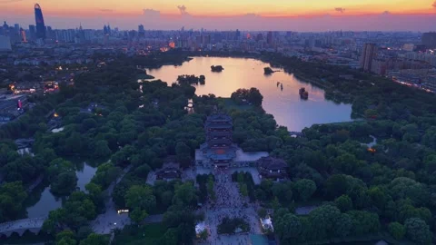 Stunning Sunset Over Daming Lake and Chaoran Tower in Jinan Stock Footage 331120022