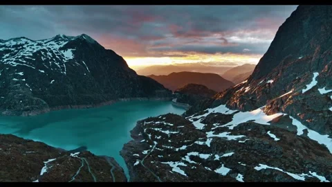 Stunning sunset over the mountains and lake in New Zealand Stock Footage 320262926