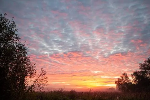 Stunning Sunset Over Rolling Fields Stock Photos
