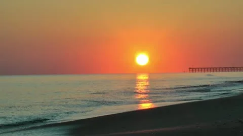 Stunning sunset over sea and pier Stock Footage