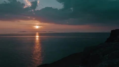 Stunning Sunset Over Tranquil Ocean Waves in 4K UHD Stock Footage 323836309