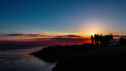 Stunning sunset over Yellow River aerial timelapse footage Stock Footage 304223308