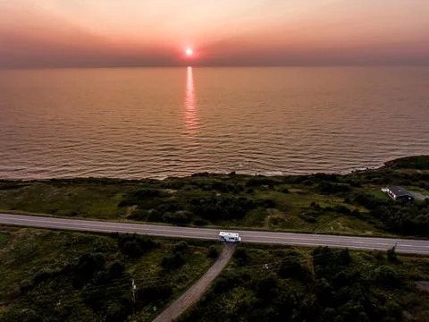 Stunning Sunset panoramic view of the Cape Breton Island Coast line cliff sce Stock Photos