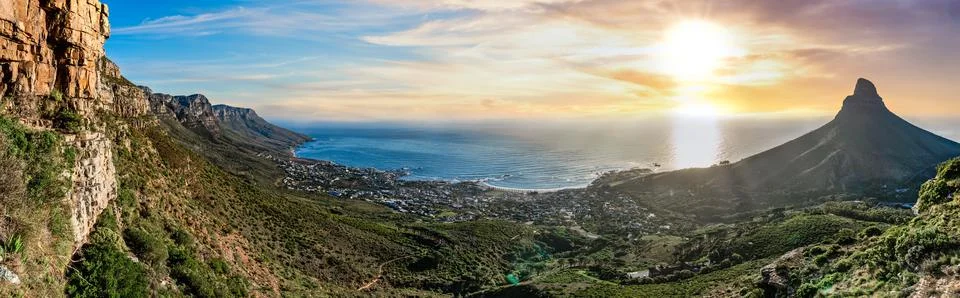 Stunning sunset panoramic view from Table Mountain out towards Lion's Head Stock Photos