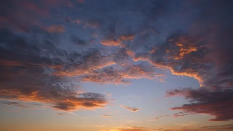 Stunning sunset sky timelapse video captures dramatic clouds. Stock Footage 309966728