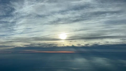 Stunning sunset sky view captured from airplane window with crepuscular ray.. Stock Footage 337805557