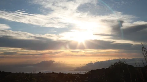 Stunning Sunset through the Clouds on top of a Volcano Stock Footage