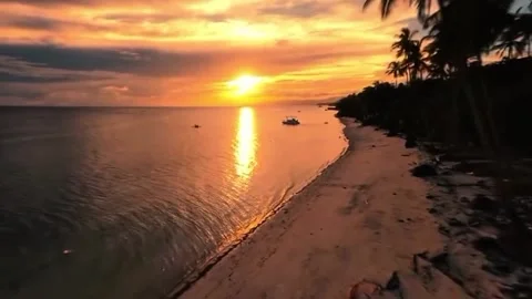 A stunning sunset on a tropical beach 스톡 동영상 329201612