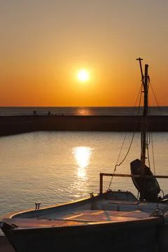 Stunning sunset view at the quiet remote fishing port in Taiwan. Stock Photos